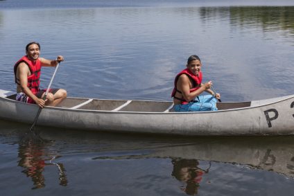 Two people in a canoe.